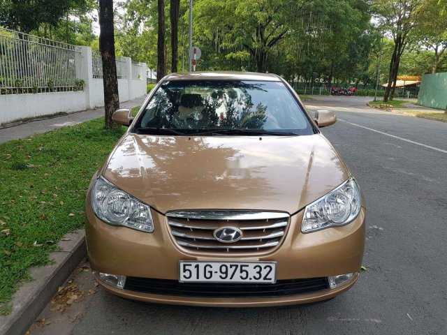 Bán xe Hyundai Elantra 1.6 MT 2011, màu nâu vàng0