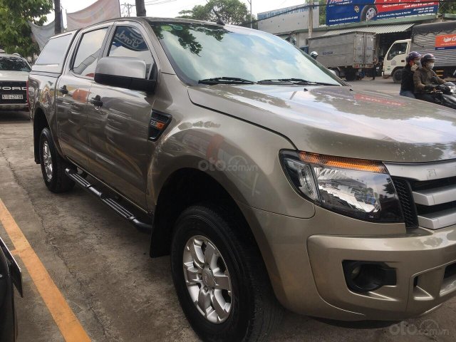 Bán xe Ford Ranger số sàn 2 cầu đời 2014, màu vàng, nhập khẩu Thái Lan0