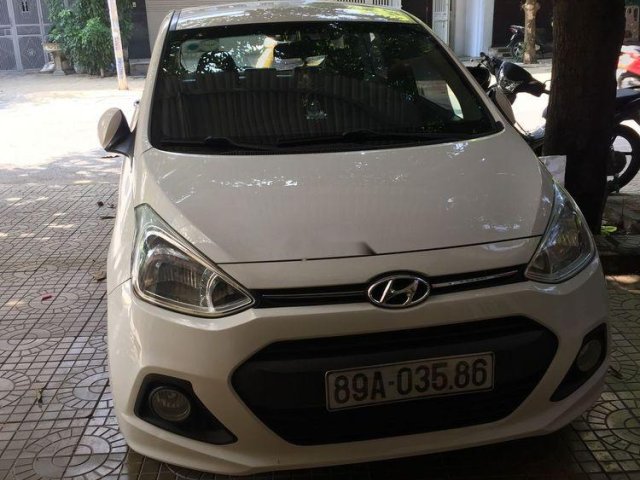 Cần bán gấp Hyundai Grand i10 năm 2014, màu trắng, xe nhập chính chủ0