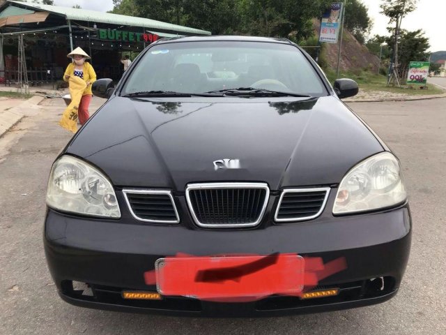 Bán xe Daewoo Lacetti sản xuất 2004, màu đen, nhập khẩu xe gia đình0