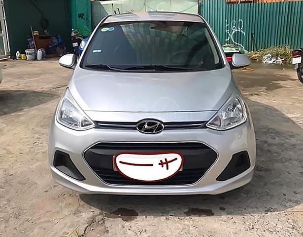 Cần bán xe Hyundai Grand i10 1.2 MT Base sản xuất năm 2015, màu bạc, nhập khẩu nguyên chiếc0