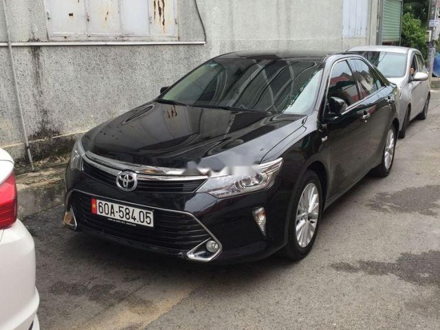 Gia đình bán Toyota Camry 2.0E năm 2019, màu đen0