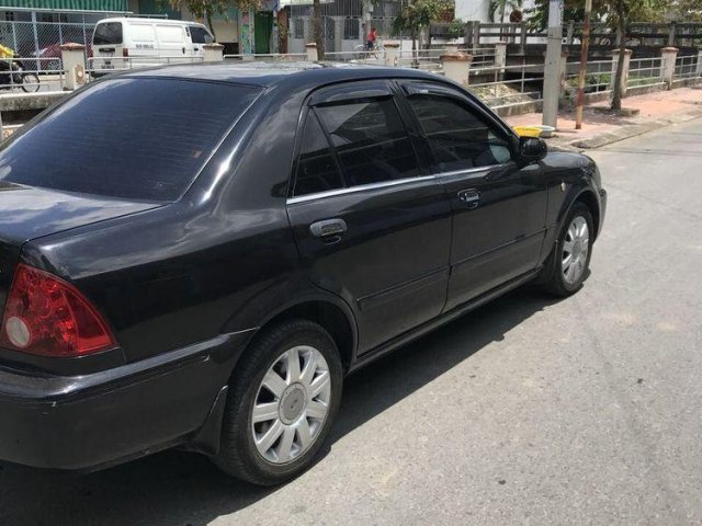 Cần bán Ford Laser đời 2002, màu đen, xe nhập chính chủ, giá 180tr