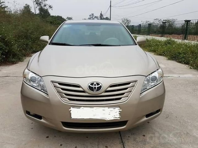 Cần bán xe Camry LE 2007, số tự động, màu vàng cát