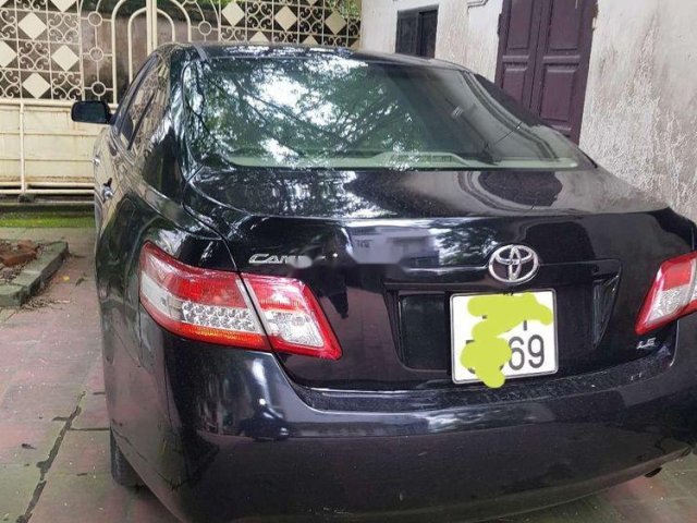 Chính chủ bán xe Toyota Camry 2.5LE form 2010, màu đen, nhập khẩu