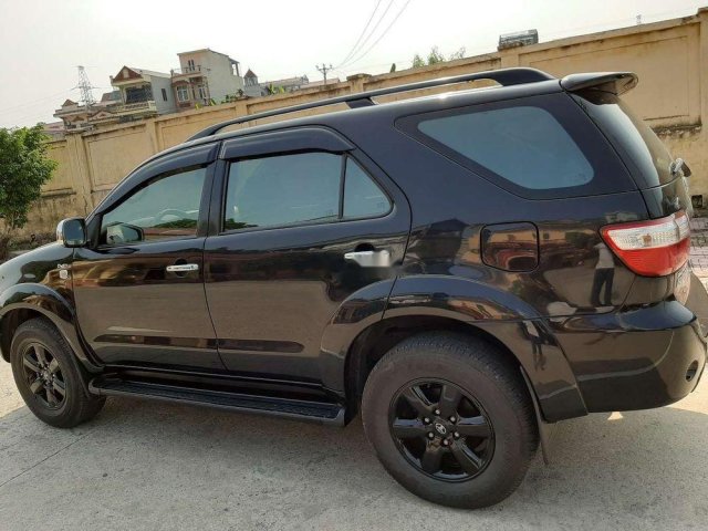 Gia đình bán Toyota Fortuner 2010, màu đen0