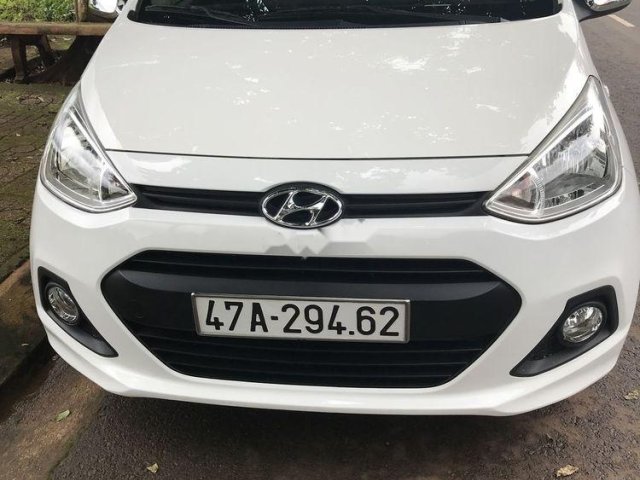 Bán ô tô Hyundai Grand i10 đời 2015, màu trắng, nhập khẩu chính chủ0