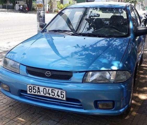 Bán Mazda 323 đời 2001, màu xanh lam, giá chỉ 120 triệu0