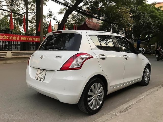 Bán Suzuki Swift 1.4AT đời 2015, màu trắng, nhập khẩu  