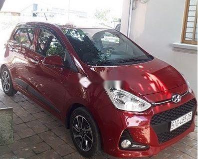 Cần bán Hyundai Grand i10 năm 2017, màu đỏ, số sàn, 300tr0