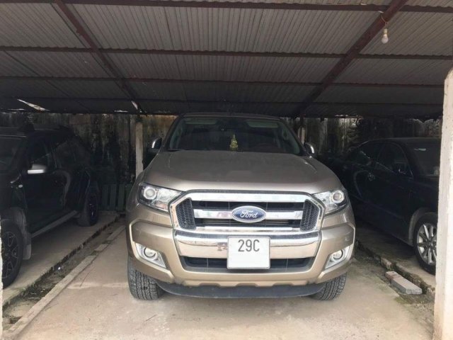 Chính chủ bán Ford Ranger XLT sản xuất 2016, màu vàng cát0