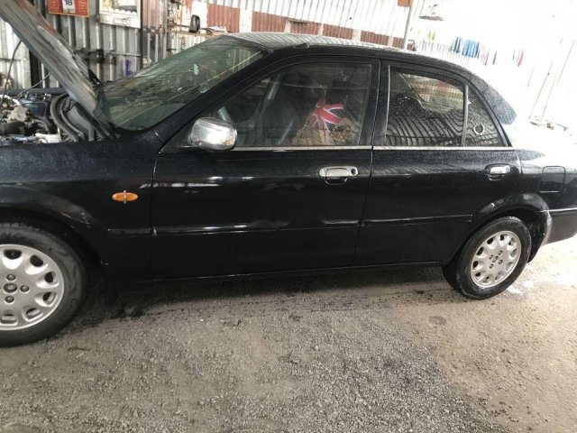 Bán Ford Laser năm sản xuất 2000, màu đen, xe nhập0