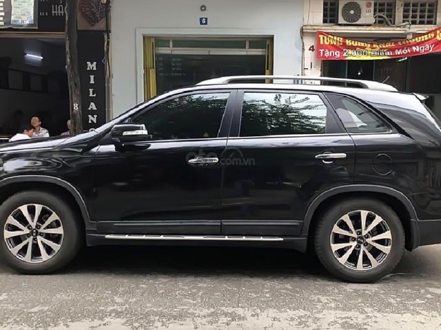 Xe Kia Sorento GATH sản xuất năm 2015, màu đen xe gia đình  