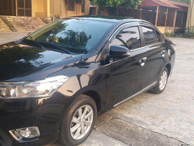 Cần bán xe Toyota Vios 2014, màu đen xe gia đình0