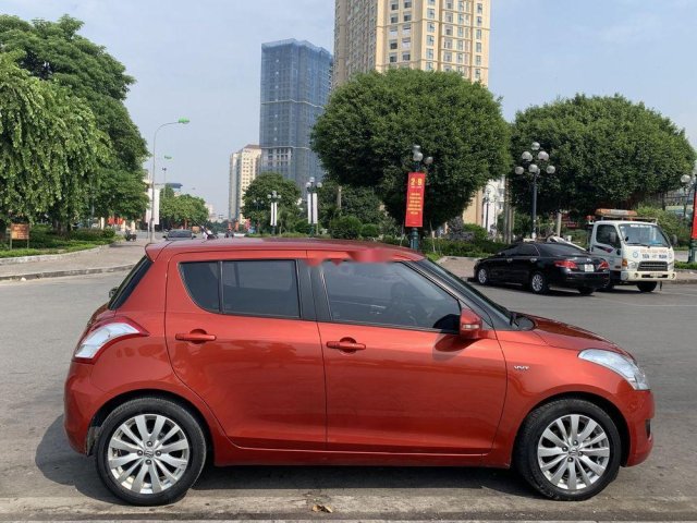 Cần bán xe Suzuki Swift AT đời 2014, giá chỉ 405 triệu0