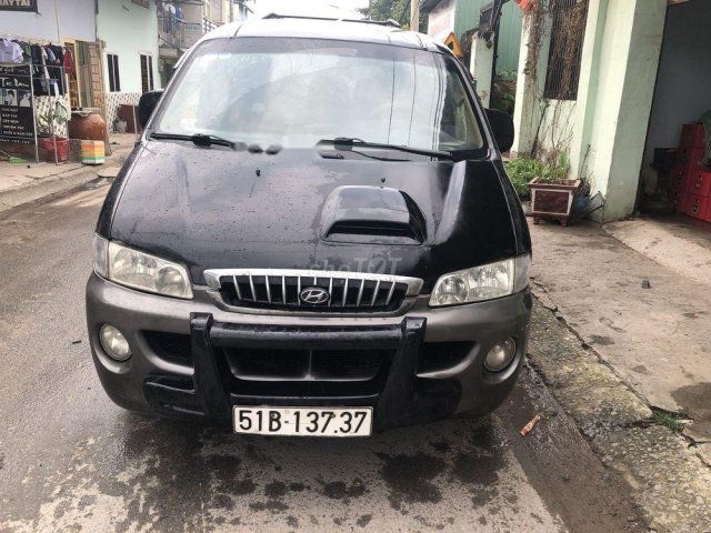 Bán xe Hyundai Starex đời 2002, màu đen0