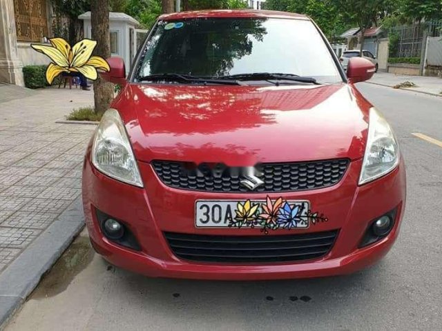 Bán Suzuki Swift 1.4 AT đời 2015, màu đỏ0