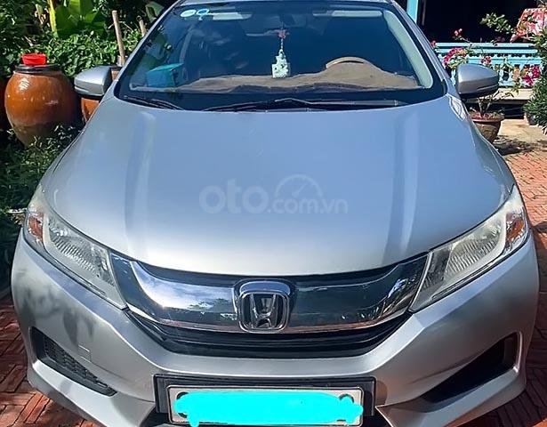 Cần bán lại xe Honda City 1.5 MT năm 2015, màu bạc chính chủ0