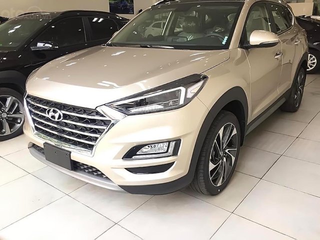 Bán Hyundai Tucson 1.6 AT Turbo đời 2019, màu vàng, giá 910tr0