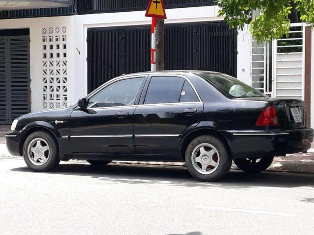 Chính chủ bán Ford Laser 1.6MT đời 2003, màu xanh dưa