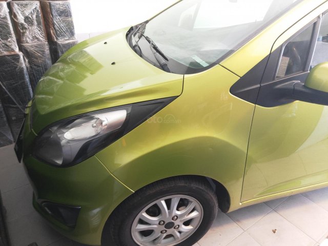 Cần bán gấp Chevrolet Spark đăng ký lần đầu 2013, màu xanh lục xe gia đình giá chỉ 235 triệu đồng0