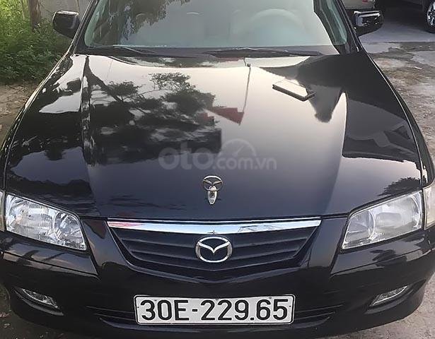 Bán xe cũ Mazda 626 1.6 sản xuất năm 2004, màu đen, nhập khẩu  0