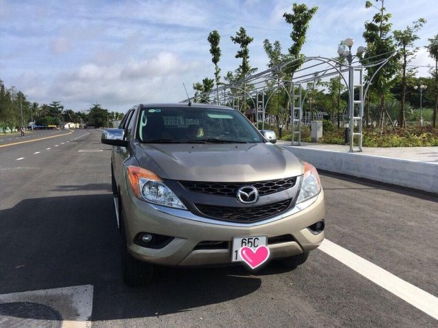 Bán Mazda BT 50 đời 2015, màu vàng, nhập khẩu, đi gia đình còn mới