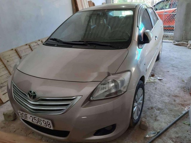 Bán Toyota Vios 1.5E đời 2011, màu vàng cát0