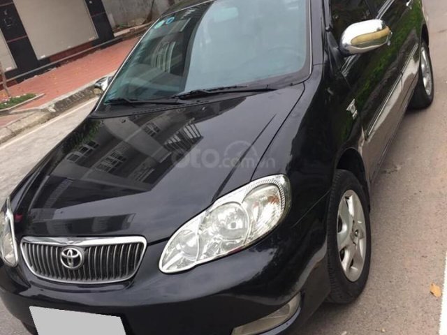 Cần bán Corolla Altis 2005 số sàn, màu đen, xe zin cọp