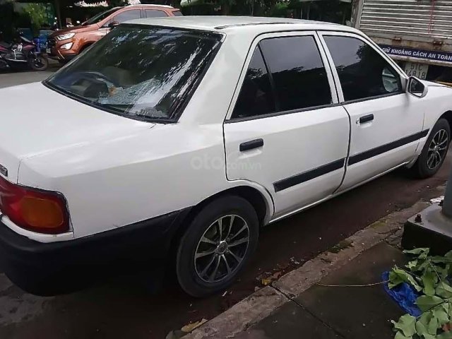 Bán Mazda 323 1.6 MT năm sản xuất 1995, màu trắng, 50tr