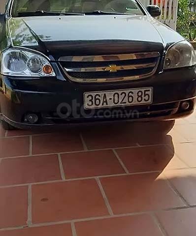 Bán Chevrolet Lacetti 1.6 đời 2012, màu đen số sàn, 198tr0