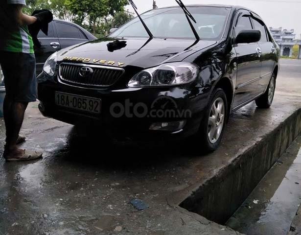 Bán Toyota Corolla Altis 1.8G MT sản xuất 2006, màu đen số sàn, giá 275tr0