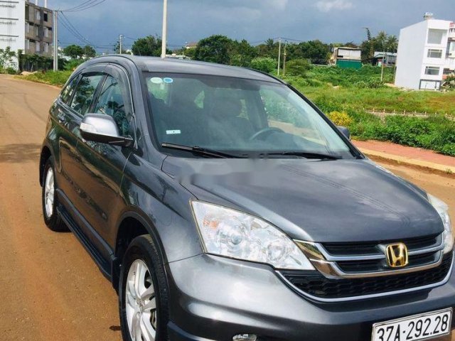 Gia đình bán ô tô Honda CR V năm sản xuất 2010, màu xám