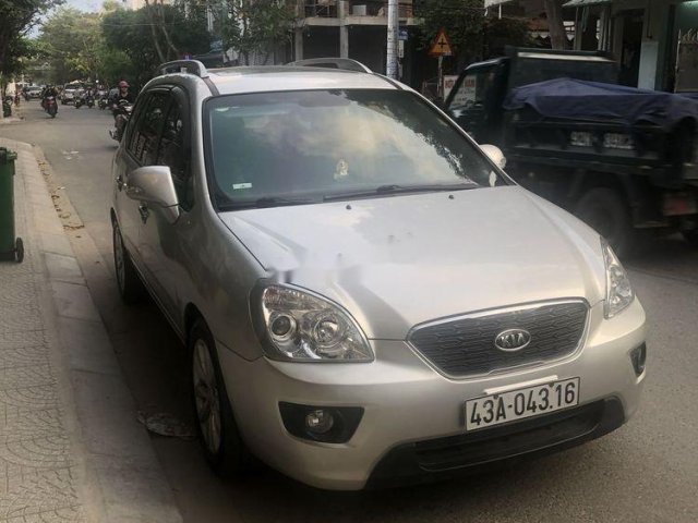 Cần bán Kia Carens 2012, màu bạc0