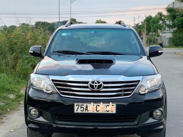 Chính chủ bán xe Toyota Fortuner đời 2014, màu đen0