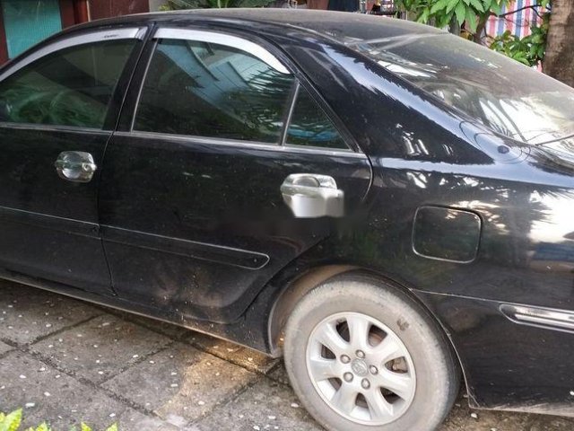 Bán ô tô Toyota Camry năm sản xuất 2004, màu đen0