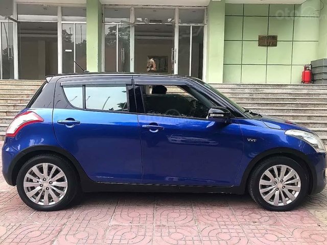 Bán Suzuki Swift 5 cửa đời 2014, màu xanh lam, chính chủ0