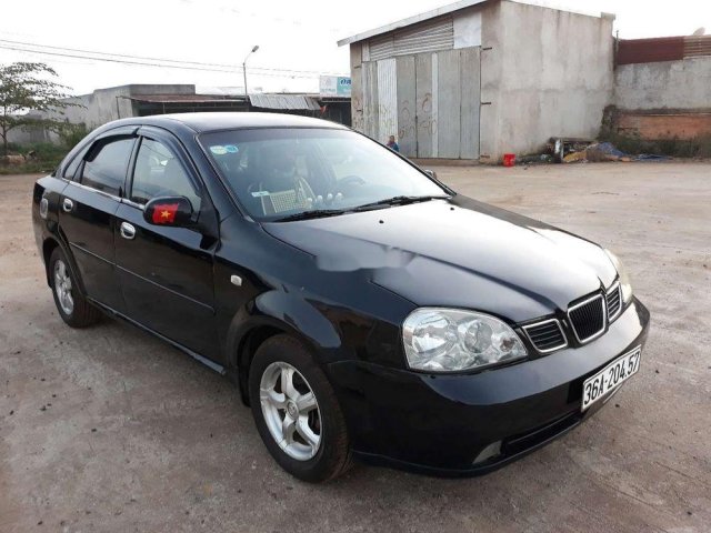 Cần bán Daewoo Lacetti -xe gia đình đời 2005, màu đen, nhập khẩu, giá tốt0