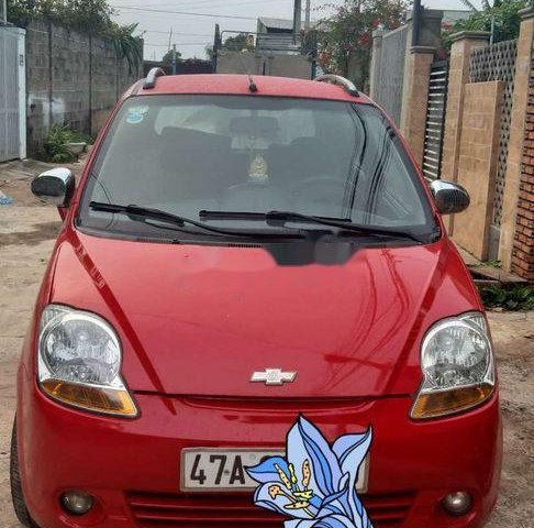 Gia đình lên 7 chỗ cần bán Chevrolet Spark đời 2009, màu đỏ, 125tr