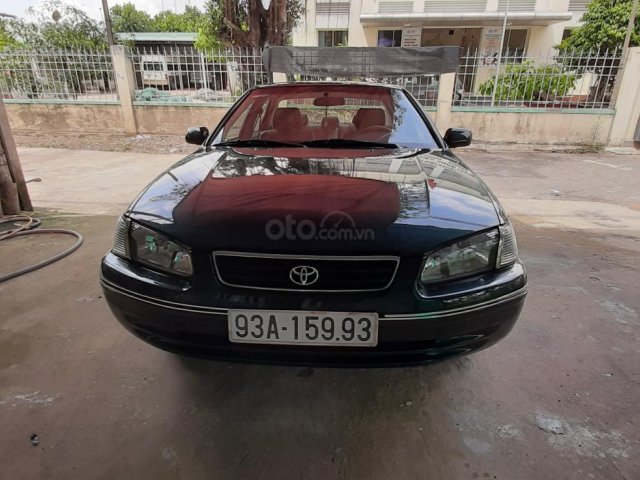 Cần bán gấp Toyota Camry đăng ký lần đầu 1999, màu xanh vỏ dưa, xe gia đình, giá tốt 240 triệu đồng0