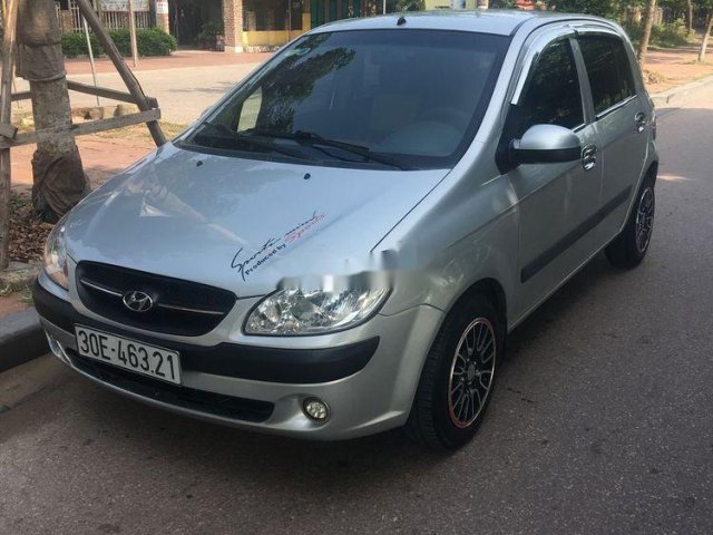 Chính chủ bán Hyundai Getz 2009, màu bạc0