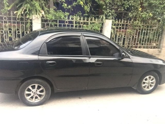 Cần bán Daewoo Lacetti năm sản xuất 2001, màu đen, giá rẻ