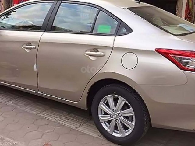 Cần bán lại xe Toyota Vios G 2014, màu vàng, chính chủ0