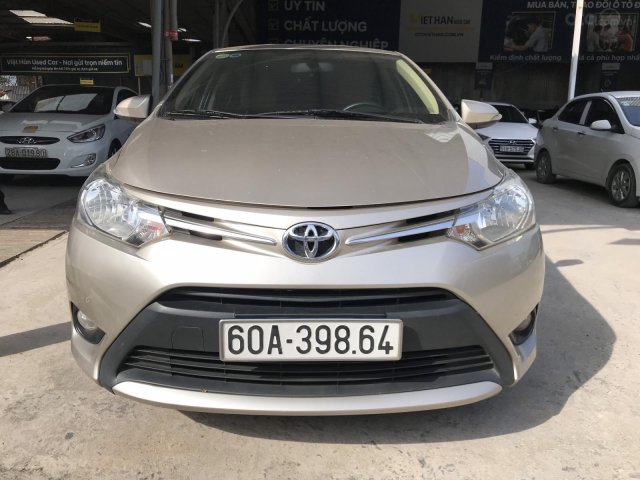 Bán Toyota Vios E 1.5MT màu vàng cát, số sàn, sản xuất 2017, một chủ