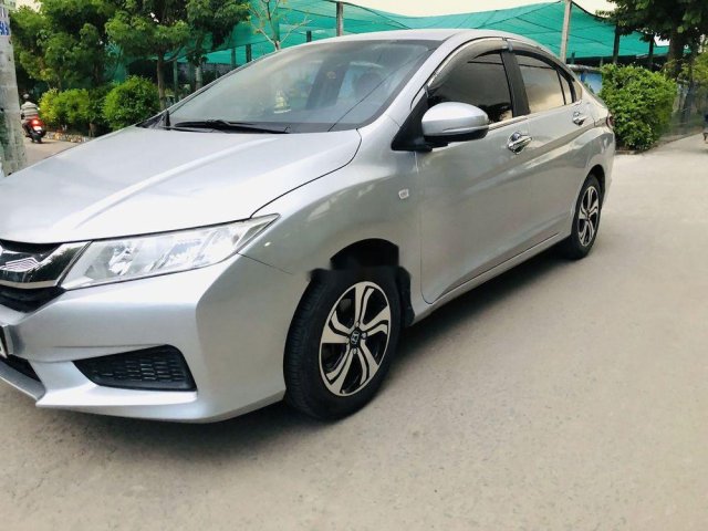 Cần bán lại xe Honda City đời 2014, màu bạc còn mới