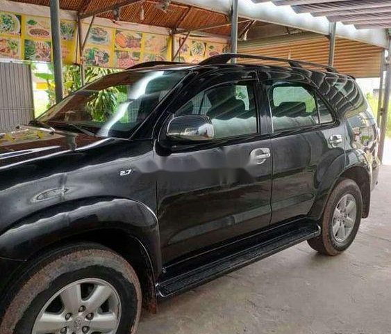 Cần bán xe Toyota Fortuner 2.7AT đời 2011, màu đen số tự động, 650tr