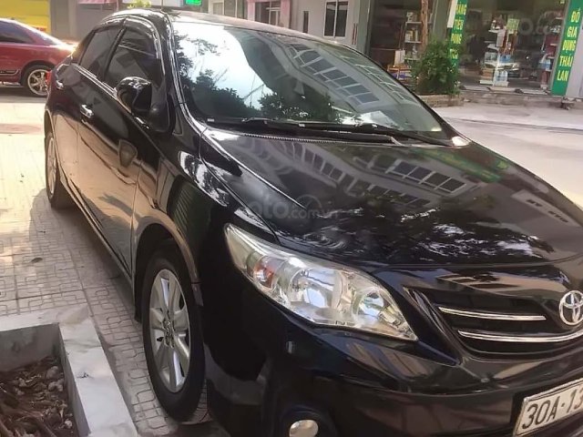 Cần bán Toyota Corolla Altis 1.8G AT đời 2014, màu đen, chính chủ