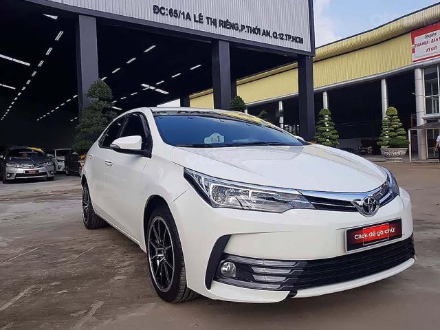 Bán Toyota Corolla Altis 1.8G AT đời 2018, màu trắng, số tự động0