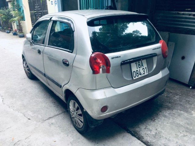 Cần bán xe Chevrolet Spark 2009, màu bạc0