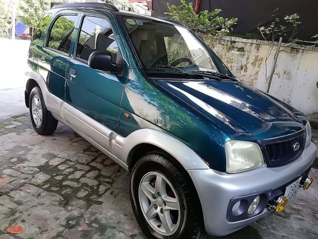 Cần bán Daihatsu Terios 1.3 4x4 MT sản xuất năm 2003, màu xanh lam